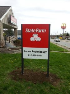 State Farm yard sign on lawn 