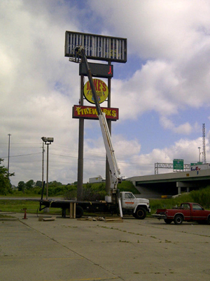 Office Building Sign Being Repaired